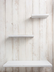 wooden shelves at white background