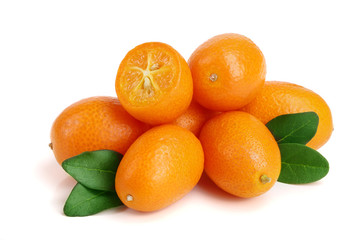 Cumquat or kumquat with leaf isolated on white background close up
