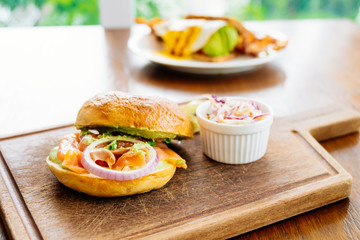 Bagel bread with smoked salmon meat and vegetable