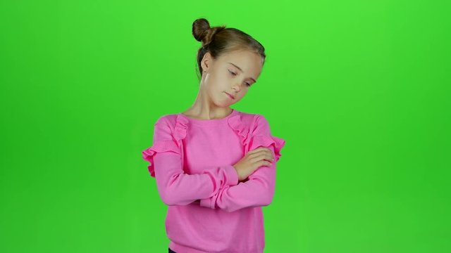 Child is sad in an empty room. Green screen