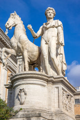 Fototapeta na wymiar Statue of Pollux with his horse at Piazza del Campidoglio on Capitoline Hill, Rome, Italy