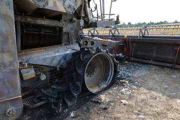 Fototapeta premium Detail of burnt out combine harvester