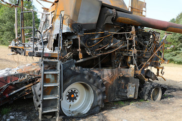 Combine harvester destroyed by fire