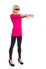 Fototapeta premium Serious Blond Fashion Model Is Directing