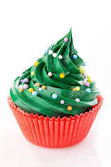 Green cupcake in red cup