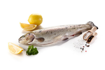 Fresh raw trout on white background