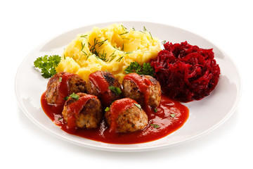 Roasted meatballs, mashed potatoes and vegetables
