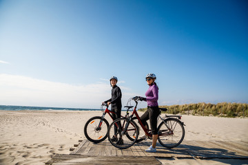 Fototapeta na wymiar Healthy lifestyle - people riding bicycles