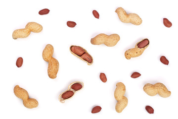 Peanuts with shells isolated on white background, top view. Flat lay pattern