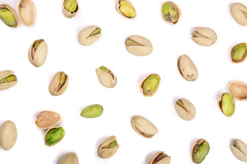 Obraz premium Pistachios isolated on white background, top view. Flat lay pattern