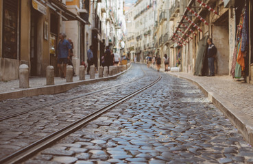 Obraz premium Beautiful narrow old street in Lisbon.