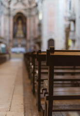 The interior of the church with benches.