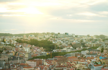 Fototapeta na wymiar View of old city and modern city of Lisbon at sunset.