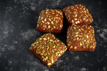 Rustic organic sandwich buns with pumpkin seeds