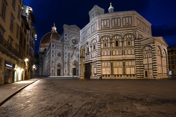 Fototapeta na wymiar View of the Baptistery and the Cathedral of Santa Maria del Fiore in the night illumination. Florence, Italy