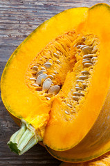 top view on sliced pumpkin with seeds