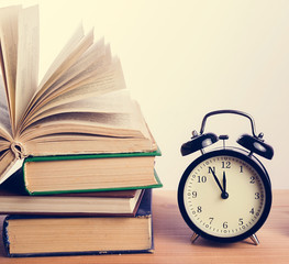 books and alarm clock