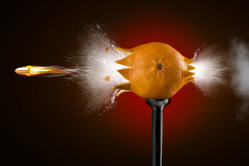 shot pistol tangerine spray splashes fire smoke black background sparks flight bullets speedy photographed imitation