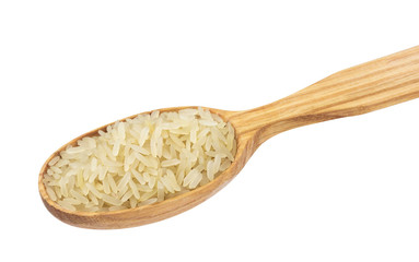 Parboiled rice in wooden spoon isolated on white background