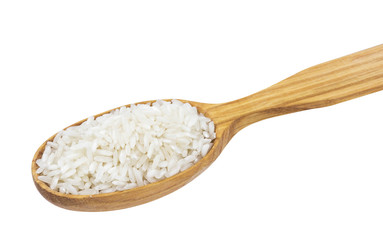 Basmati rice groats in wooden spoon isolated on white background
