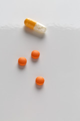 Pills blister packs and white pills bottle