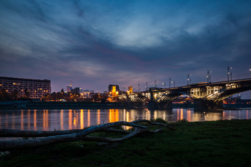 Fototapeta na wymiar Poniatowski bridge over the Vistula river in Warsaw, Poland