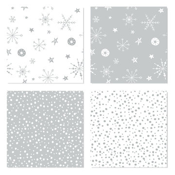 Seamless winter patterns. Set of Christmas backgrounds with hand drawn snowflakes. Holiday themed seamless patterns for wrapping paper, textile and wallpaper.