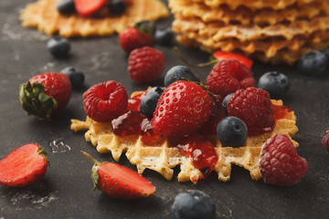 Round belgium waffles with berries