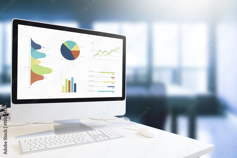 Poster Modern computer with keyboard and mouse on white table showing charts and graph on screen against blue tone blurred office background , Analysis Business, Statistics Concept.