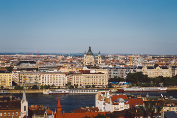 Naklejka na ściany i meble Evening sun on the facade of the Parliament building across Danube river, Budapest Hungary.