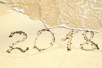 The inscription on sand 2018