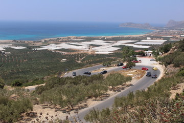 Fototapeta na wymiar Panoramic view of beautiful Mediterranean sea and Falassarna Beach, taken from the top of the hill in western part of Crete island in Greece.
