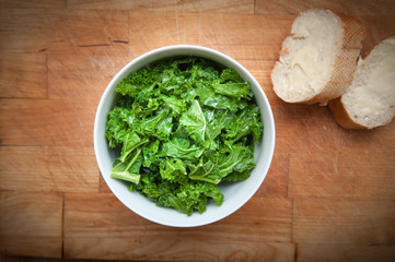 Bowl of healthy green kale, food with nutrition