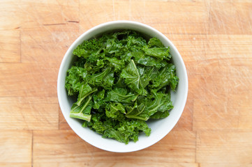 Bowl of healthy green kale, food with nutrition