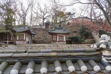 wooden pagodas in the park of seoul city in korea in winter
