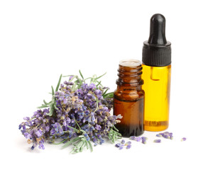 Bottle with aroma oil and lavender flowers isolated on white background