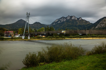 Bridge over the Dunajec river in Pieniny mountains, Poland © Artur Bociarski