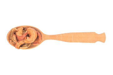 Dry slices apple in spoon