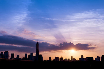 Fototapeta premium silhouette of cityscapes bangkok city on sunset sky background, thailand