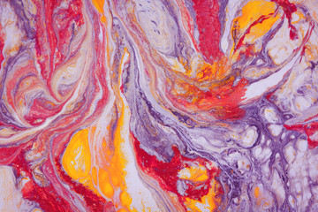 marble texture formed by mixing  colorful bright ink, abstract background