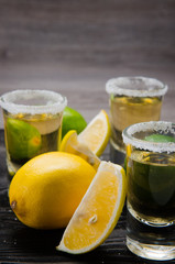 Tequila drink served in glasses with lime and salt