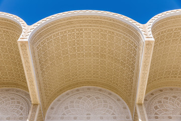 Arched stone houses richly decorated with classic Tunisian ornaments.