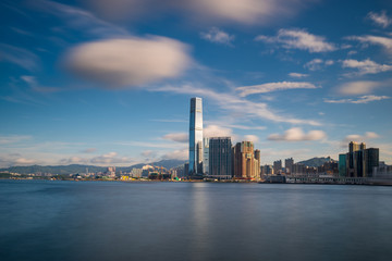 Naklejka na ściany i meble Hong Kong City skyline at sunrise. View from across central district Hongkong.