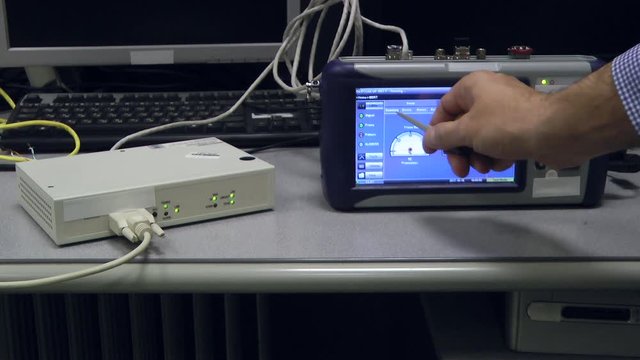 IT engineer test and maintenance telecom equipment in server room, datacenter