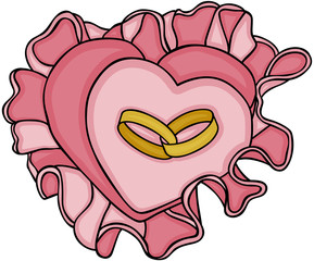 Wedding rings on heart shaped pillow
