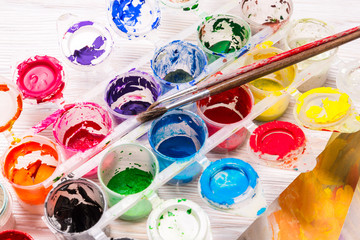 Empty jars of gouache color