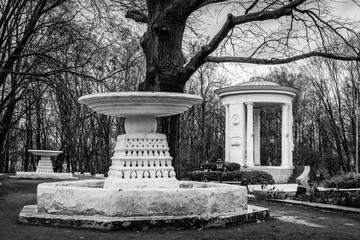 Rotunda in honor of the 800th anniversary of Moscow. Classical rotunda in Neskuchny Garden. Gorky Park in the fall. Moscow. Russia. Monochrome photography. Pelisse.