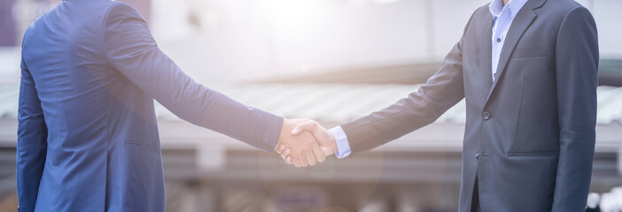 handshake of business People Teamwork Meeting .two businessman Hold hand and shake hand in city
