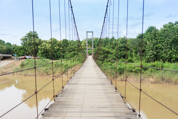 Rope bridge over the river.