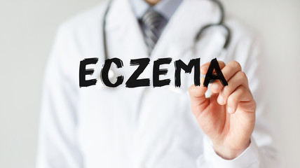 Doctor writing word ECZEMA with marker, Medical concept